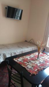 Кровать или кровати в номере Peatonal Colonial
