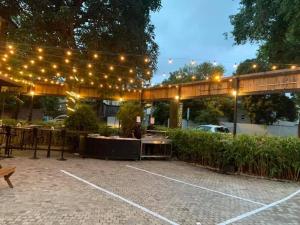 a patio with a table and lights on it at Blackout Boutique Hotel in Colombo