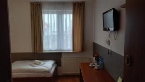 Voodi või voodid majutusasutuse EndHotel Bielany Wroclawskie toas