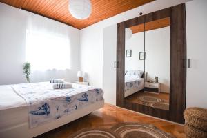 Postel nebo postele na pokoji v ubytování Villa Adriatica