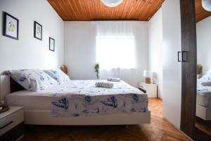 Postel nebo postele na pokoji v ubytování Villa Adriatica