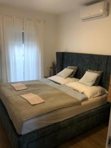 Postel nebo postele na pokoji v ubytování Apartment Vir
