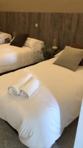 Кровать или кровати в номере El Lago