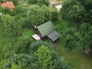 an overhead view of a house in the trees at Chata w Ciszy in Uście