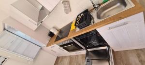 Kuchyň nebo kuchyňský kout v ubytování Apartment MAIO