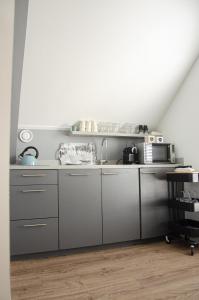 Kuchyň nebo kuchyňský kout v ubytování Bed and Breakfast Bedstay op 8