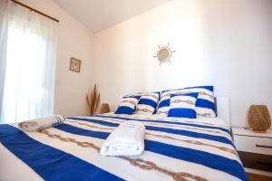 Postel nebo postele na pokoji v ubytování Villa Adriatica