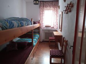 A bed or beds in a room at Stellalpina