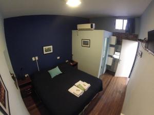 Krevet ili kreveti u jedinici u objektu Sabatico Travelers Hostel & Guesthouse