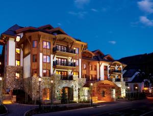 a large building with lights in front of it at The Sebastian - Vail in Vail