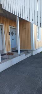 a front door of a building with a porch at Royal Katariina in Kokkola