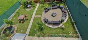 an aerial view of a backyard with a table and chairs at Oscar Residence in Nehoiu