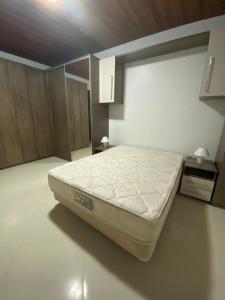 Llit o llits en una habitació de Casa ACONCHEGO no Centro de Bananeiras.