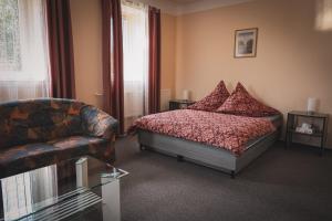 Rúm í herbergi á Hotel Apartment Faraon