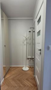 a room with a bathroom with a toilet in it at Lovely flat in heart of Wroclaw in Wrocław