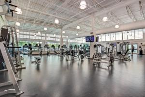 a gym with a lot of treadmills and machines at Sea Colony Ocean --- 1205N Edgewater House in Bethany Beach