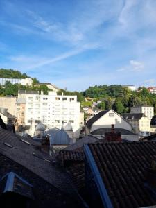 Nespecifikovaný výhled na destinaci Tulle nebo výhled na město při pohledu z apartmánu