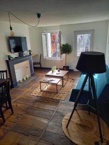 Posezení v ubytování Appartement 3 pièces centre ancien de tulle