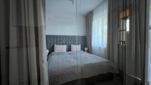 Postel nebo postele na pokoji v ubytování Villa Gravaldi