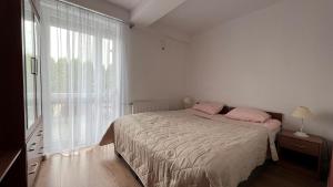Postel nebo postele na pokoji v ubytování Villa Gravaldi
