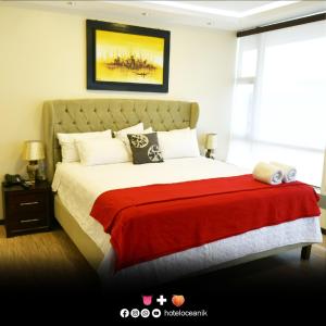 מיטה או מיטות בחדר ב-HOTEL OCEANIK