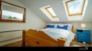 Postel nebo postele na pokoji v ubytování Apartment Ernestova hiša