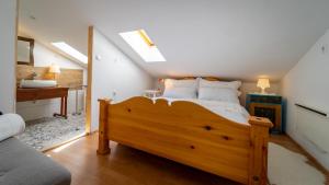 Postel nebo postele na pokoji v ubytování Apartment Ernestova hiša
