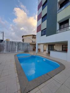 Swimmingpoolen hos eller tæt på Apto na Praia de Atalaia a 100 metros da Passarela do Caranguejo