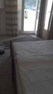 Una cama o camas en una habitación de Apartments Zdenka