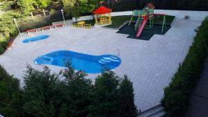 Herní místnost nebo prostor pro děti v ubytování Hotel Maria