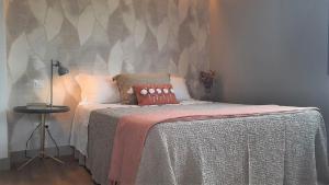 Łóżko lub łóżka w pokoju w obiekcie Cachada Turhouse