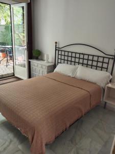 Postel nebo postele na pokoji v ubytování Joy Beach B&B