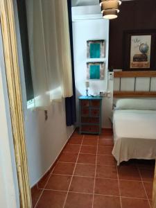 Postel nebo postele na pokoji v ubytování Joy Beach B&B