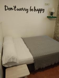 Postel nebo postele na pokoji v ubytování Joy Beach B&B