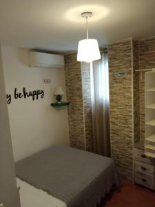 Postel nebo postele na pokoji v ubytování Joy Beach B&B