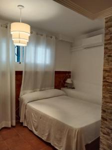 Postel nebo postele na pokoji v ubytování Joy Beach B&B