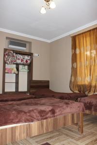 Postel nebo postele na pokoji v ubytování Guest house Maspindzeli