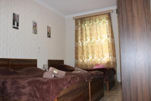 Postel nebo postele na pokoji v ubytování Guest house Maspindzeli