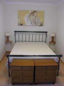 Ένα ή περισσότερα κρεβάτια σε δωμάτιο στο Retur Algarve Beach House