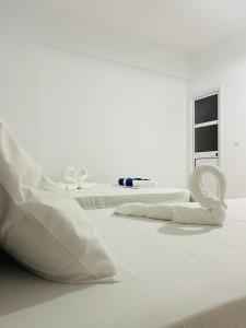 Postel nebo postele na pokoji v ubytování Orea Hotel