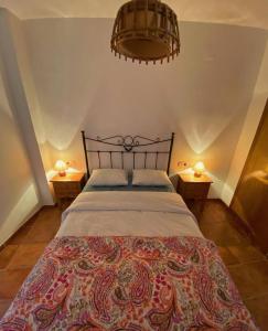 Giường trong phòng chung tại Apartamento rural el Vidre VT-42035-CS