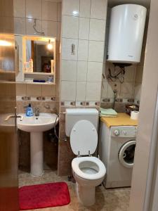 Ett badrum på Family Apartment Ivanovic