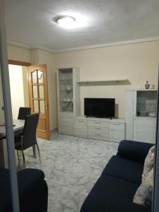 TV a/nebo společenská místnost v ubytování Casa Rural Amelia