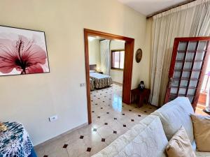 Lovely spacious apartment in the center - Vilaflor tesisinde bir odada yatak veya yataklar