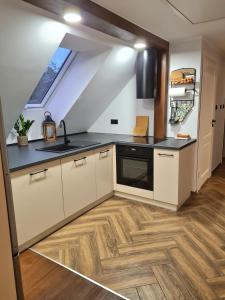 Kuchyň nebo kuchyňský kout v ubytování Apartament nad BRDĄ , agroturystyka.