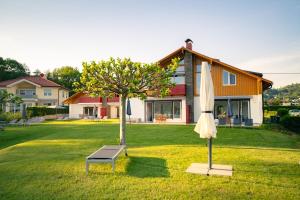 Ein Garten an der Unterkunft Seeappartements Christiane Haus 95