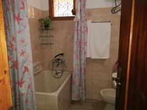 Koupelna v ubytování Alekos Beach Houses-Waters Edge