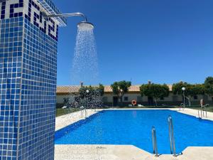 Bazén v ubytování Hostal Los Mellizos nebo v jeho okolí