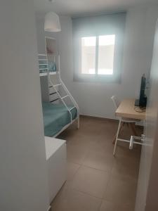 Posteľ alebo postele v izbe v ubytovaní Apartamento Punta Candor Rota