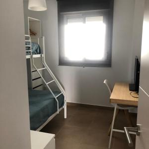 Posteľ alebo postele v izbe v ubytovaní Apartamento Punta Candor Rota